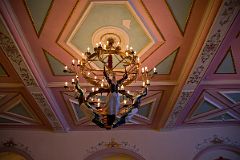 11 Chandelier Held Up By Three Female Statues At Chateau Lake Louise